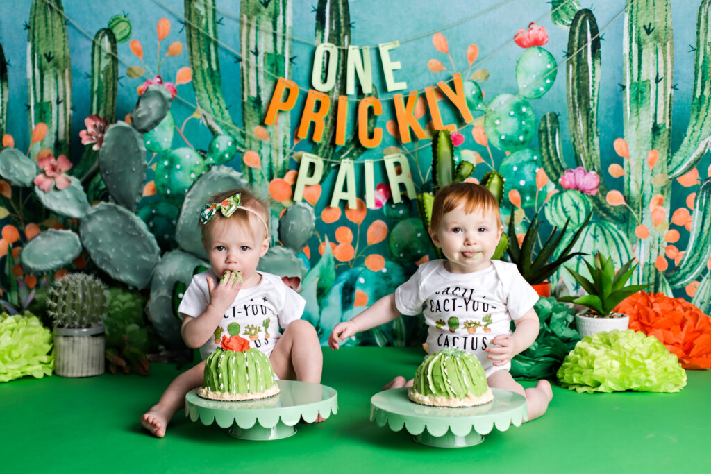 Twin boy and girl green cactus theme cake smash.