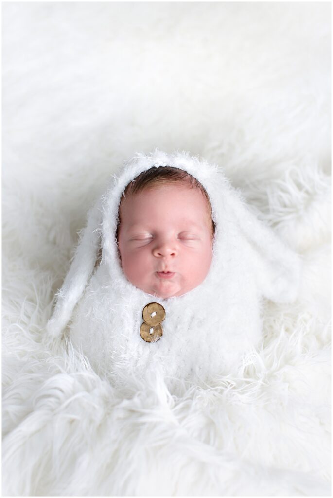Newborn Wrap Easter Bunny Pose with Older Brother | CB Studio, LLC Iowa Photographer | White wrap and background