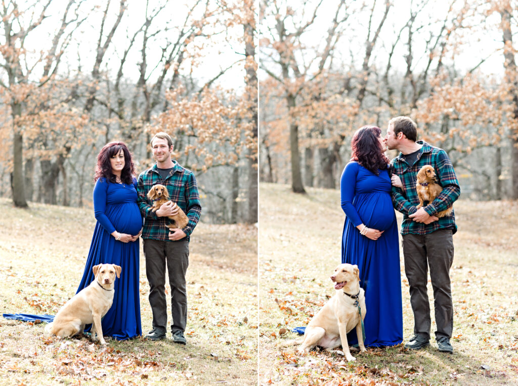 Maternity couple at a park in early spring Iowa wearing a blue flowing maternity gown with two dogs.