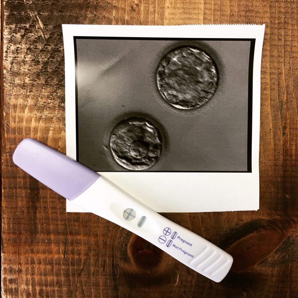 A picture of two embryos and a positive pregnancy test. Why I don't want to forget what it's like to struggle with infertility.