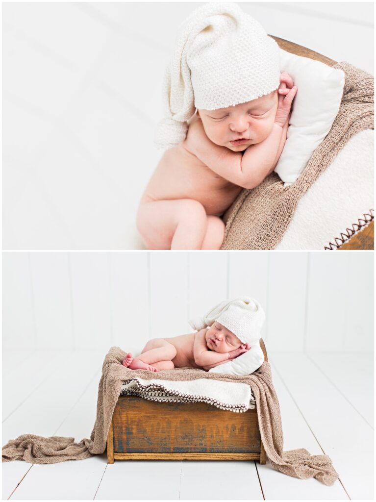 Newborn sleeping on a small bed | CB Studio | Iowa Photographer