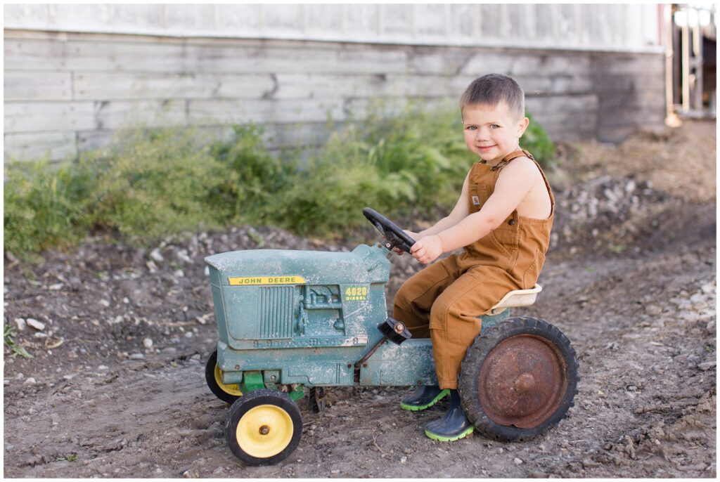 Toddler farm boy with tractor | Iowa Children Photographer | CB Studio