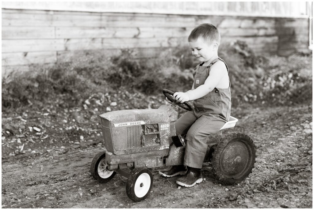 Toddler farm boy with tractor | Iowa Children Photographer | CB Studio