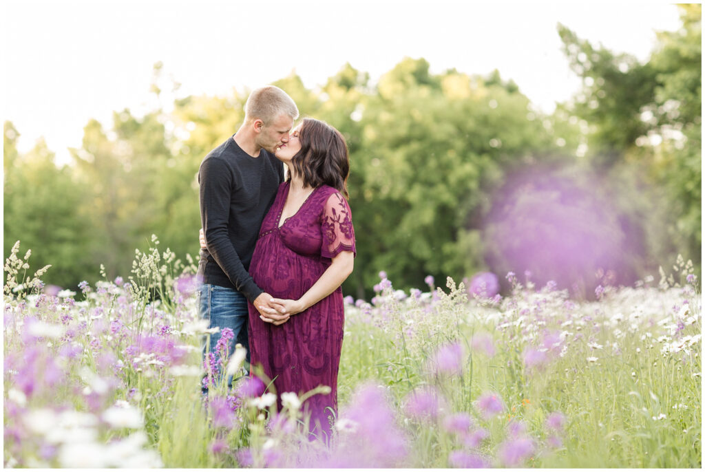 Maternity session in a flower pasture | Maternity Poses | Iowa Maternity Photographer | CB Studio
