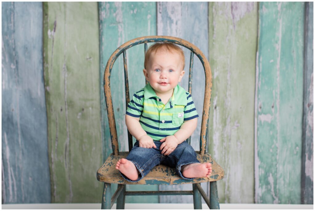 Sitter session with rustic chair and greens and blues wood background | Iowa Baby Photographer | CB Studio