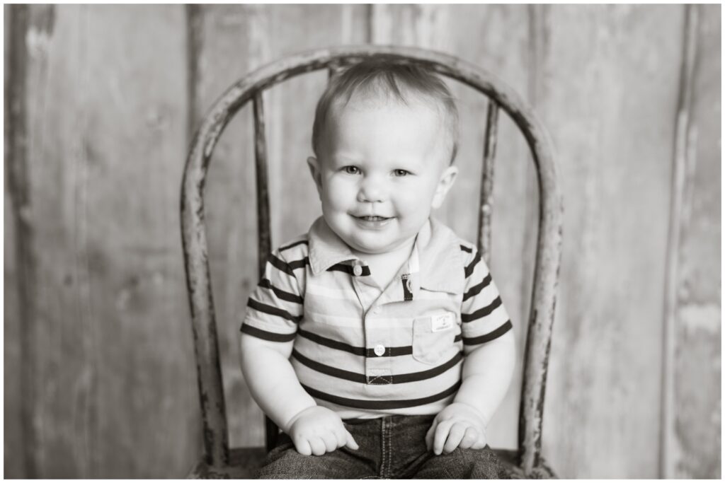 Sitter session with rustic chair and greens and blues wood background | Iowa Baby Photographer | CB Studio