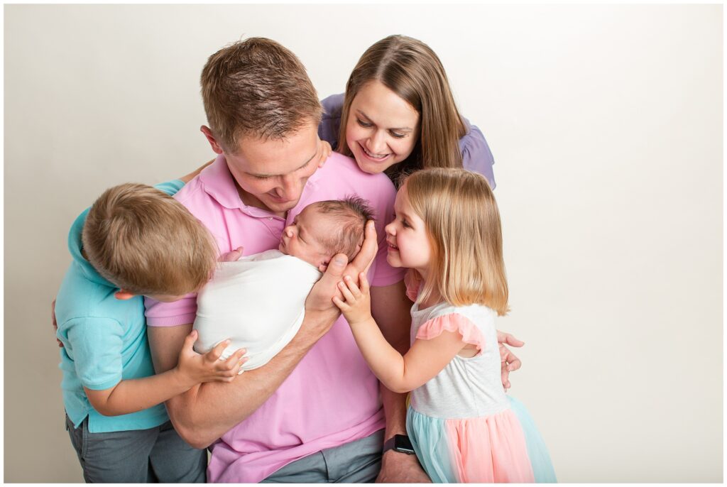 Newborn family pose | Iowa Newborn Photographer | CB Studio