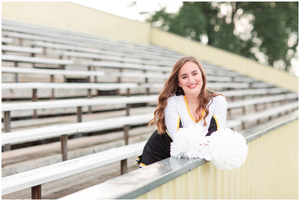 Senior football cheerleading pose | Iowa Senior Photographer | CB Studio