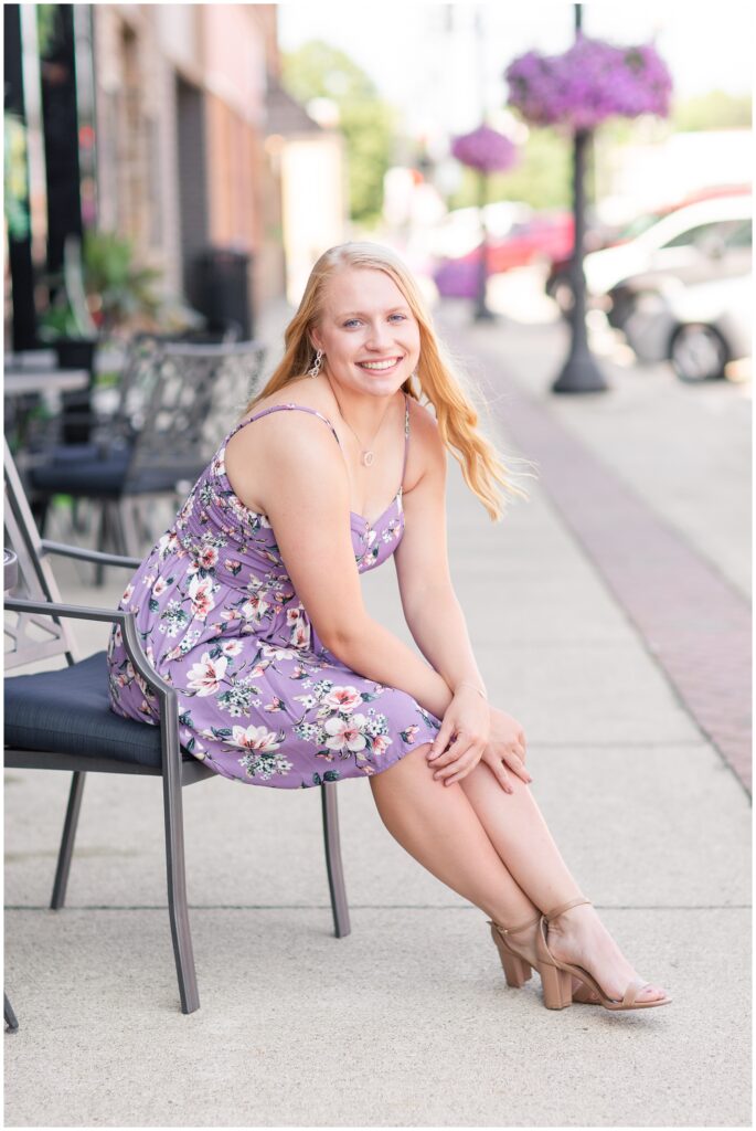 Senior downtown photo idea wearing a floral dress | Iowa Senior Photographer | CB Studio