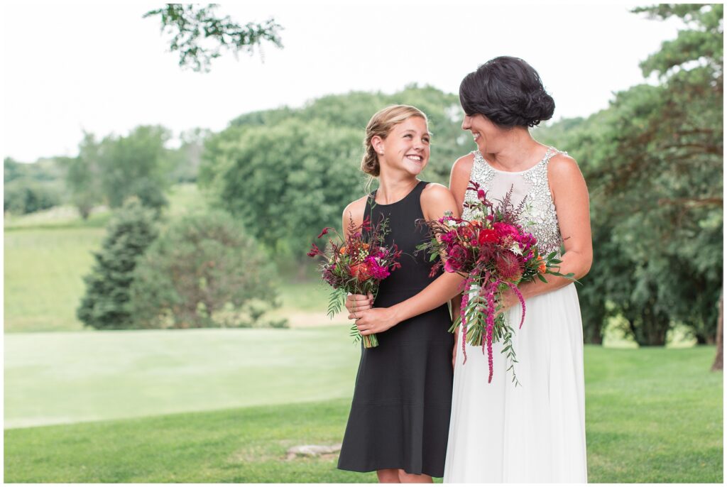 Wedding party pose on a golf course | Iowa Wedding Photographer | CB Studio