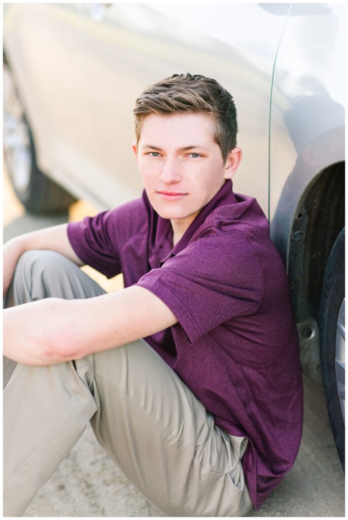 Fall senior boy session sitting next to a car | Iowa Senior Photographer | CB Studio