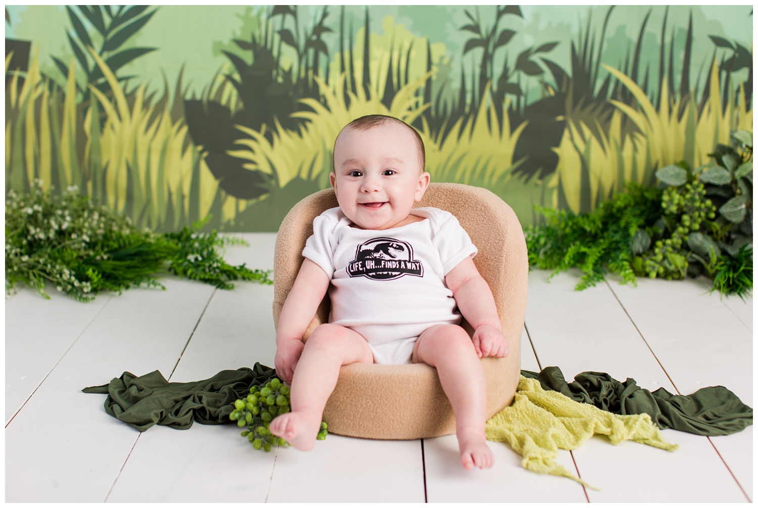 Jurassic Park themed sitter session 6 month old photos | Algona Iowa Baby Photographer | CB Studio