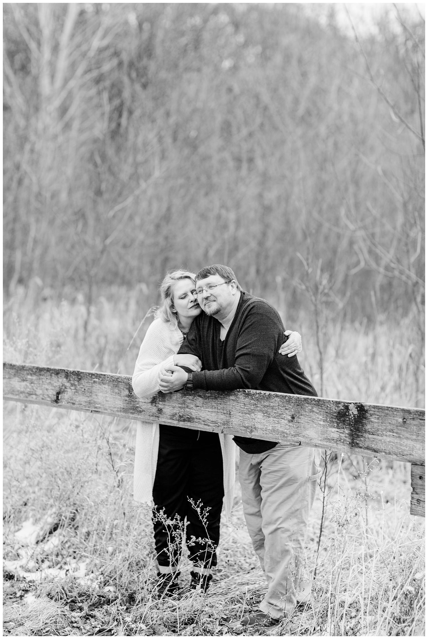 Engagement shoot in a grassy pasture in central Iowa in mid-March