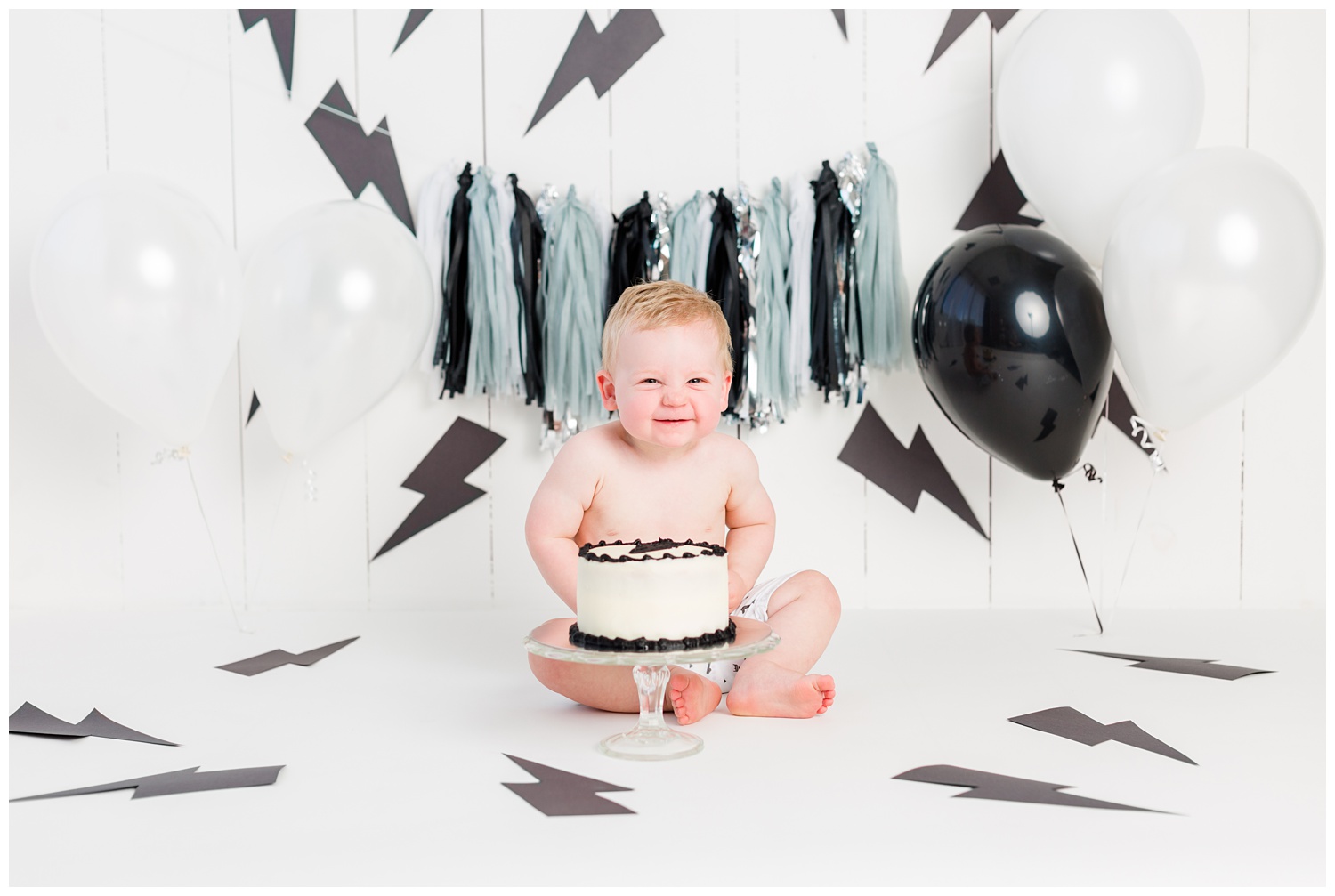 Black and white lightning themed cake smash first birthday sitter session | CB Studio