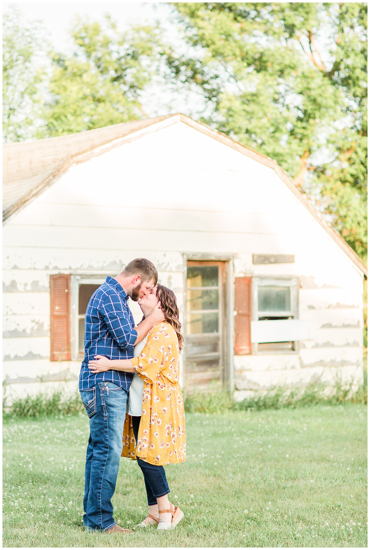Engaged couple near an abandoned home on a farm in north central Iowa | CB Studio