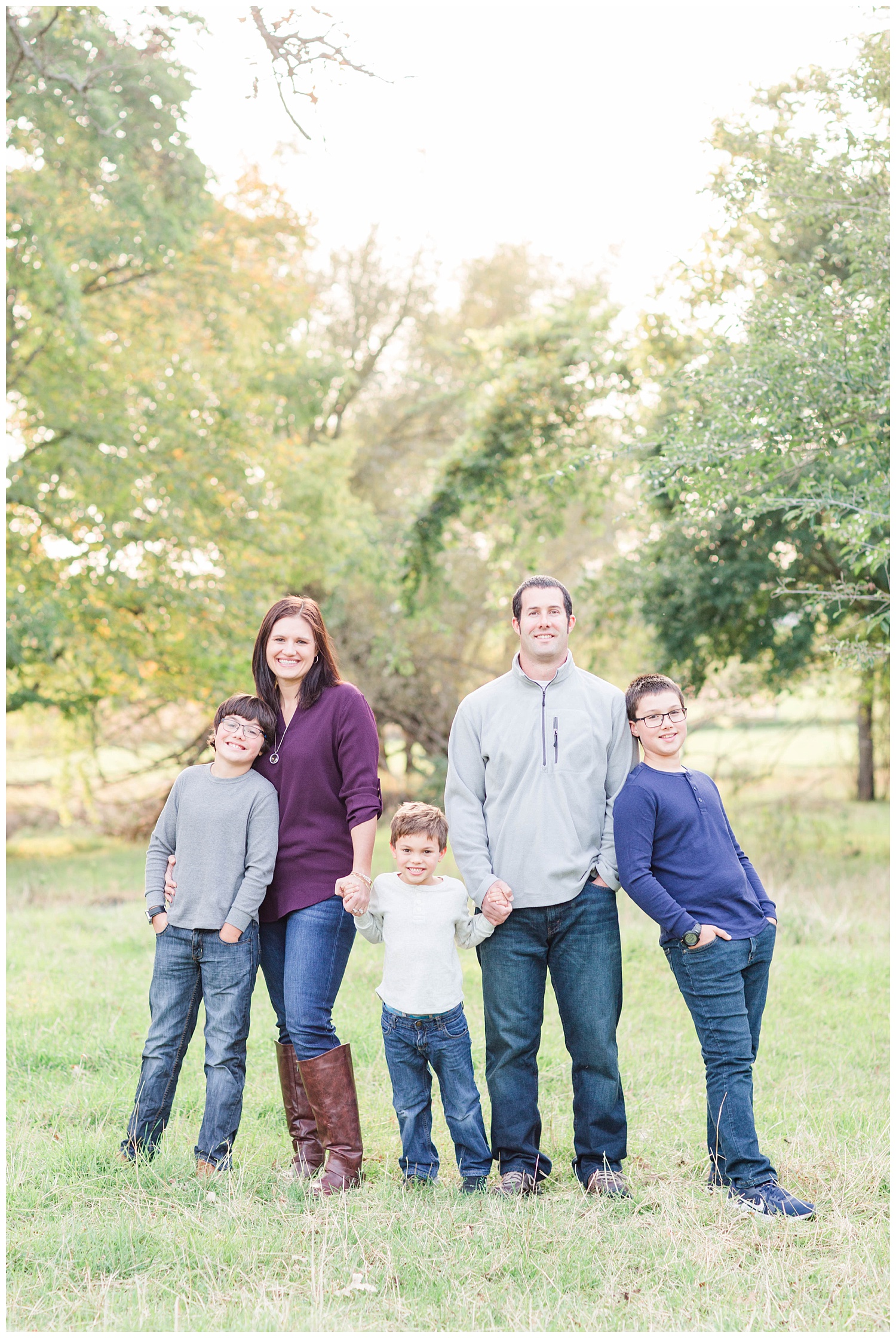Family stands in a pasture in rural Iowa | CB Studio