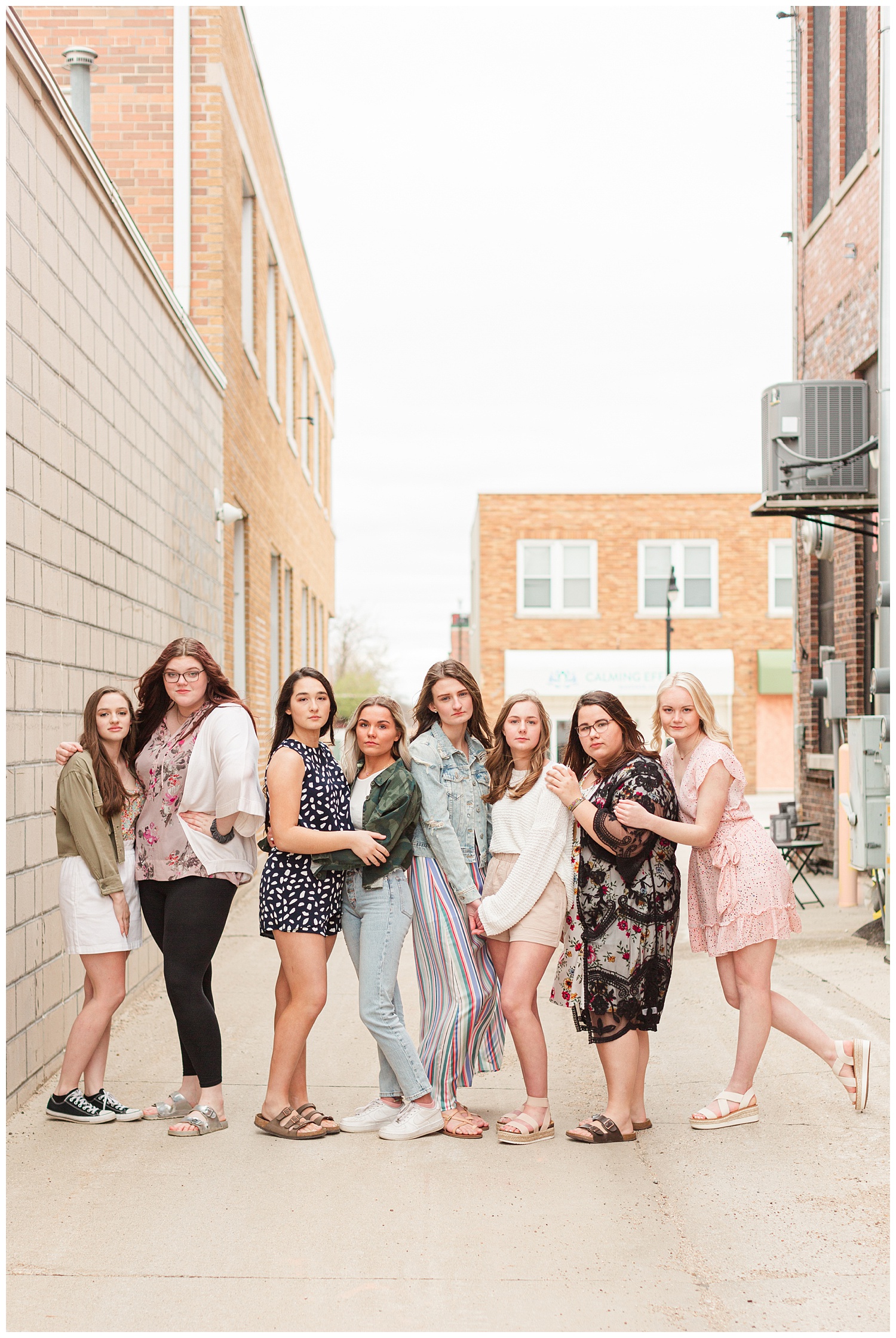 2022 CBS Senior Spokesmodel Team pose downtown Algona, Iowa. Styled in outfits from Cultivate Boutique | CB Studio