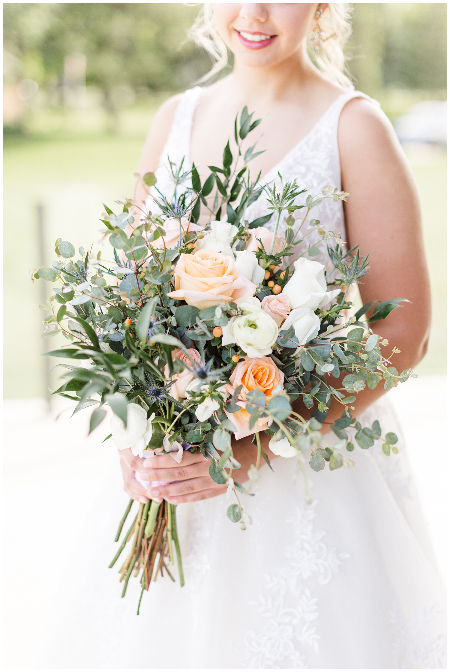 Peach and white rose wedding bouquet with white ranunculus and eucalyptus | CB Studio