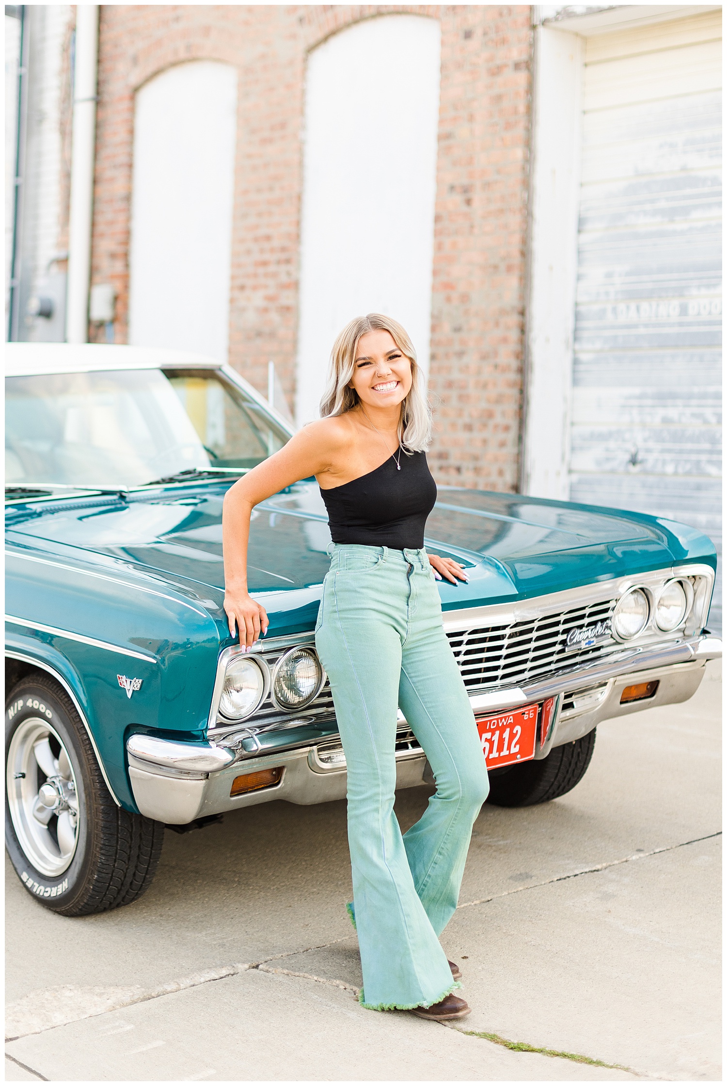 Addison laughs as she leans against a teal 1967 Chevy Bel Air | CB Studio
