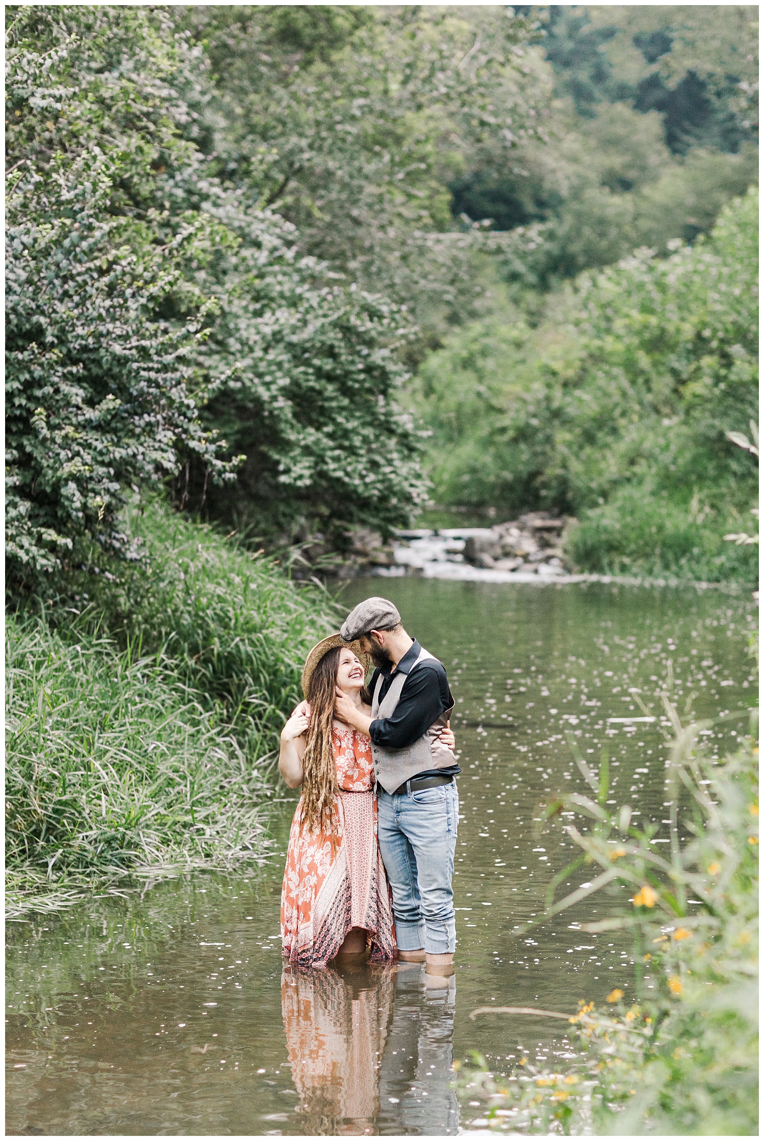 Katlyn and Brad nuzzle in close in the middle of a stream at Thomas Mitchell Park | CB Studio