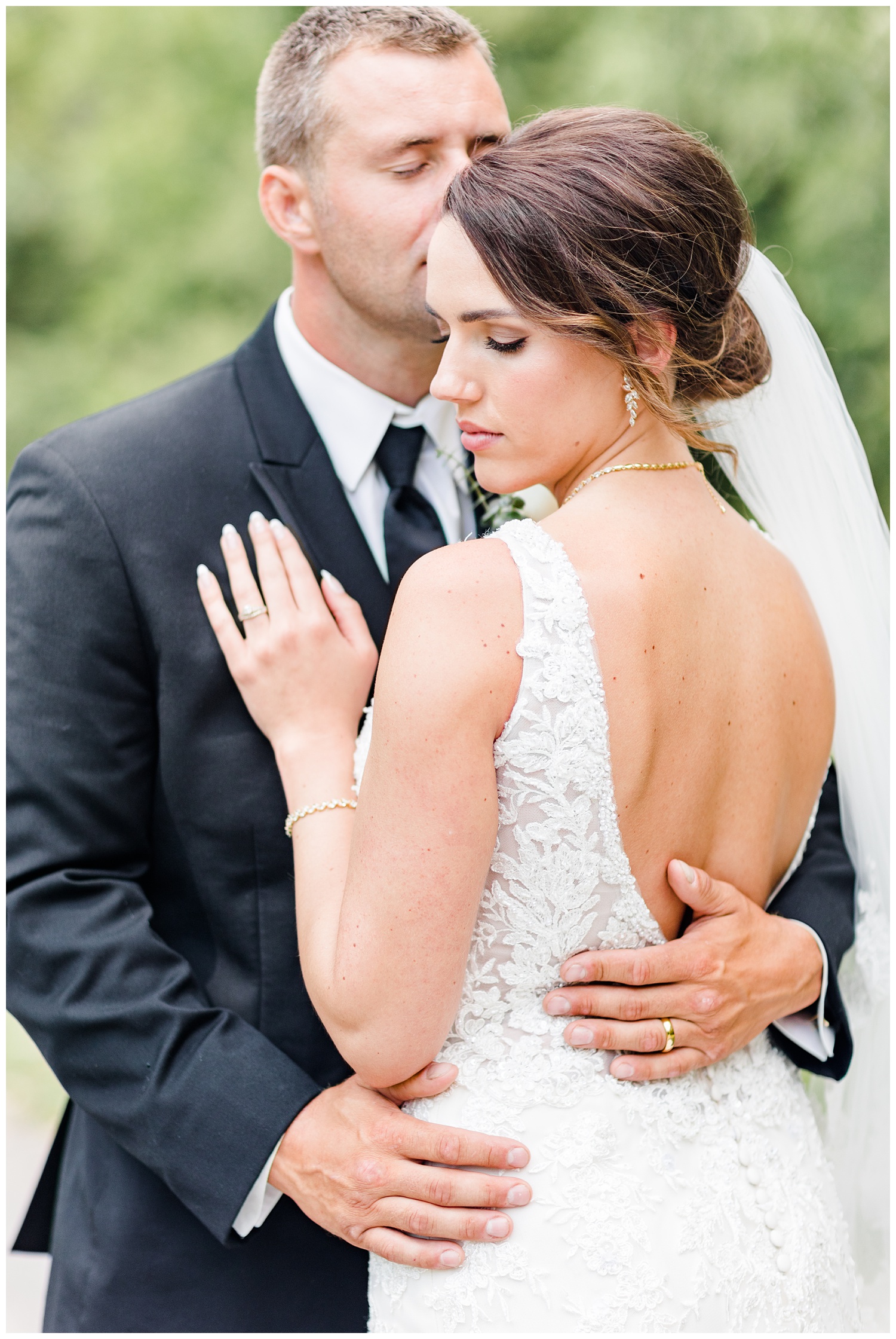 Bride and groom, Renee and Cody, embrace each other at Call State Park | CB Studio