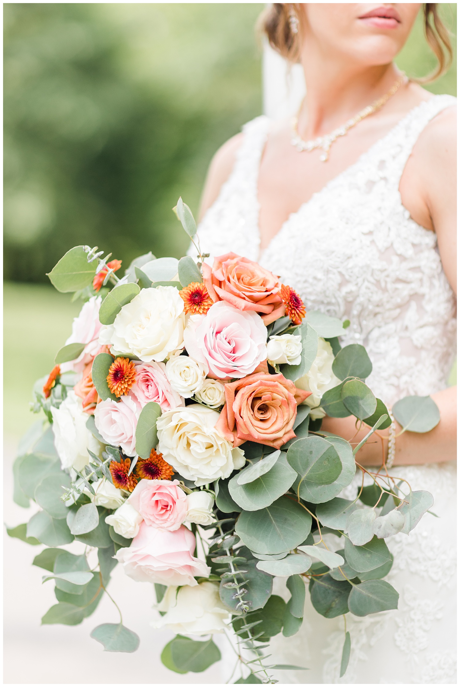Renee's bridal bouquet featuring white, light pink and dusty orange roses as well as eucalyptus | CB Studio
