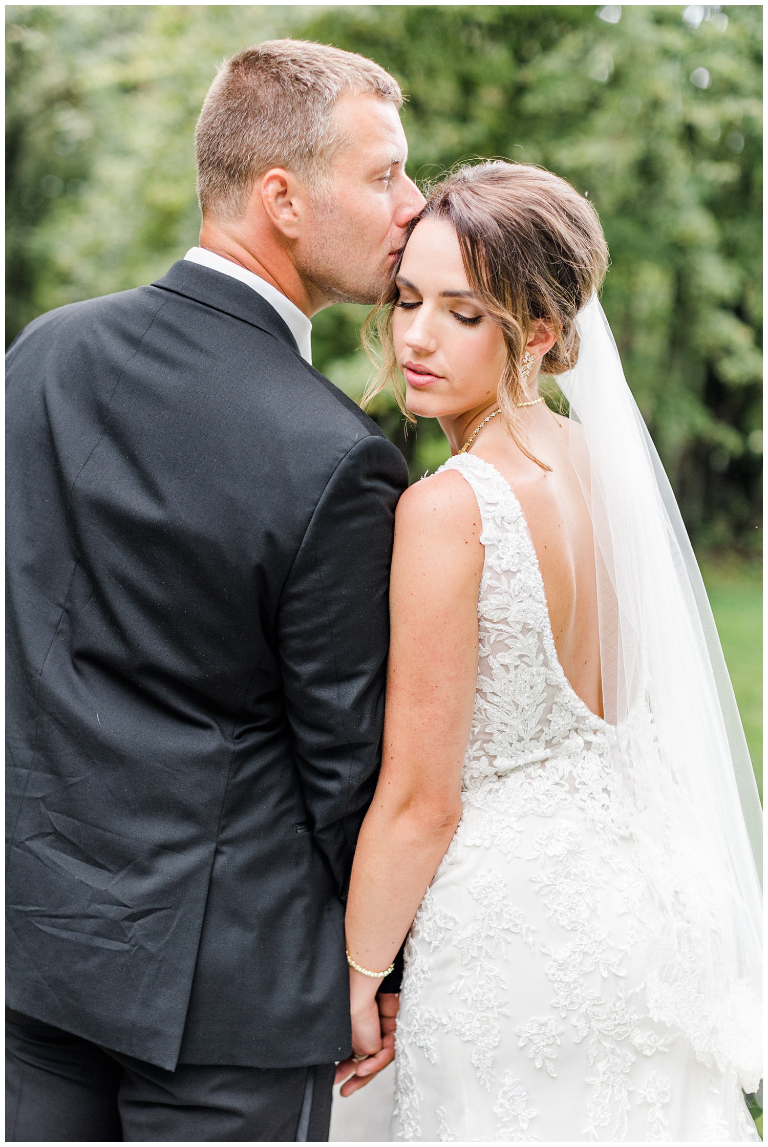 Cody kisses his bride Renee on the forehead at Call State Park before their wedding ceremony | CB Studio