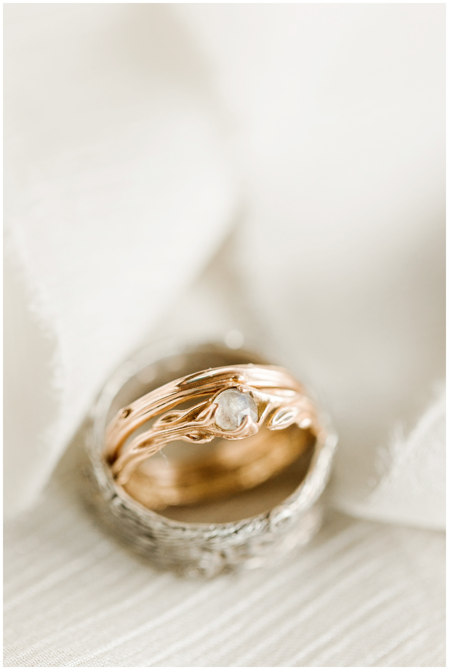 Hippie unity wedding band featuring a rose gold twig and leaf band and a center moonstone | CB Studio