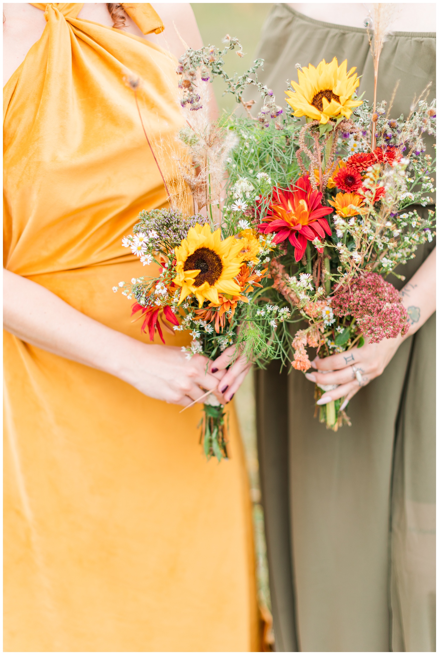 Fresh picked wildflower wedding bridesmaids bouquets featuring sunflowers, mums, cattail, Queen Anne's lace and pampas grass | CB Studio