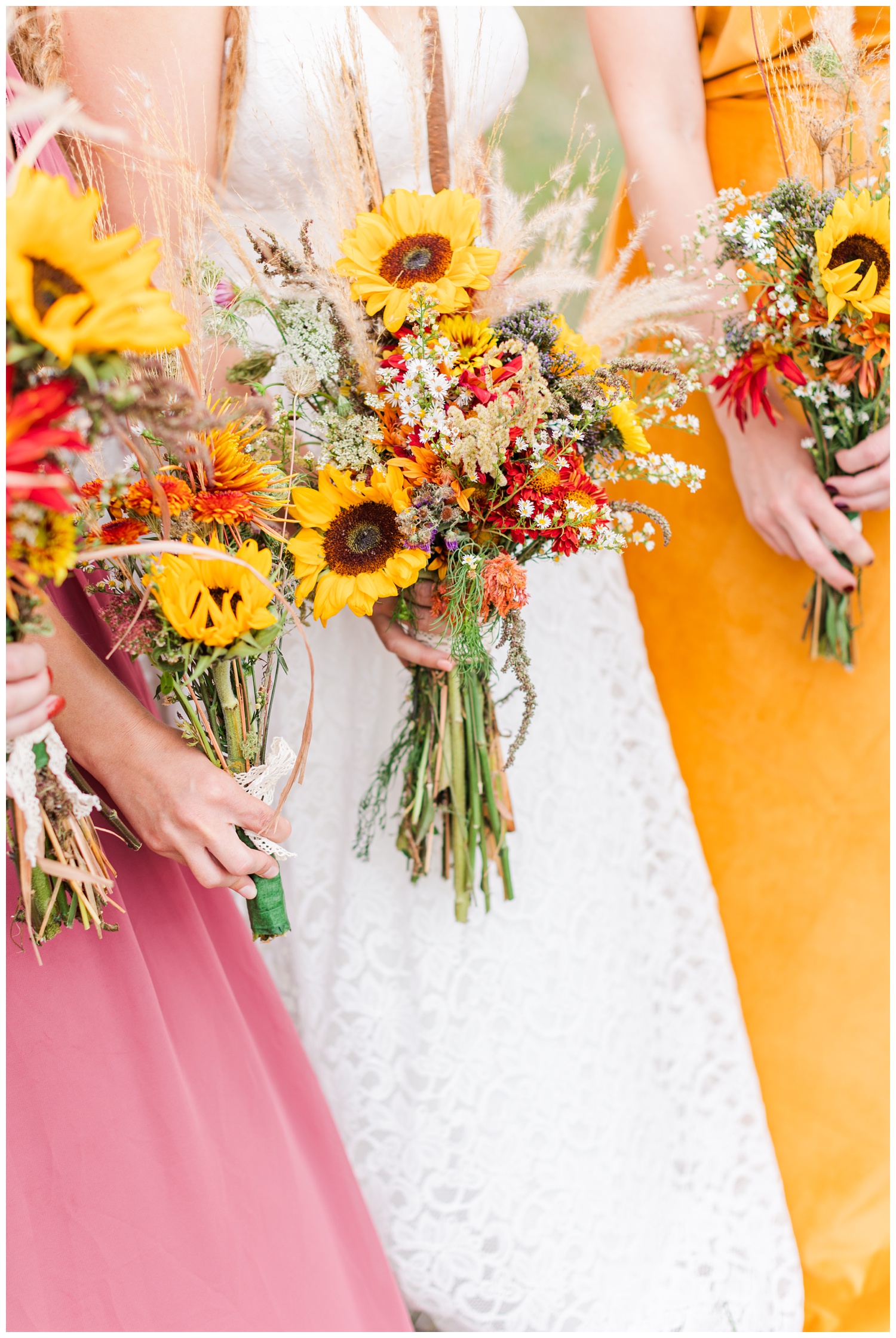 Fresh picked wildflower wedding bouquet featuring sunflowers, mums, cattail, Queen Anne's lace and pampas grass | CB Studio
