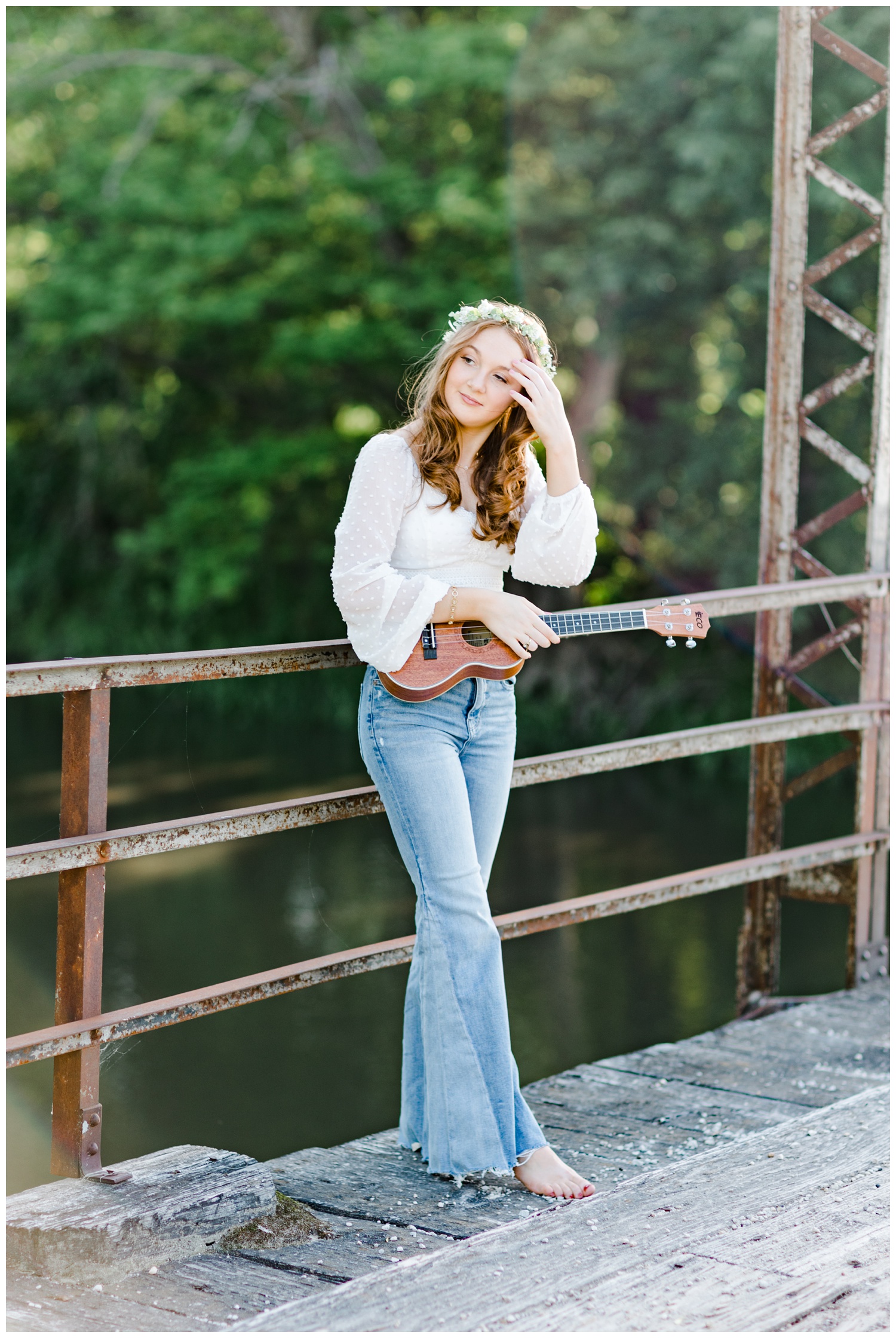 Savannah wears a boho floral crown and plays her ukulele on an old trestle bridge | CB Studio