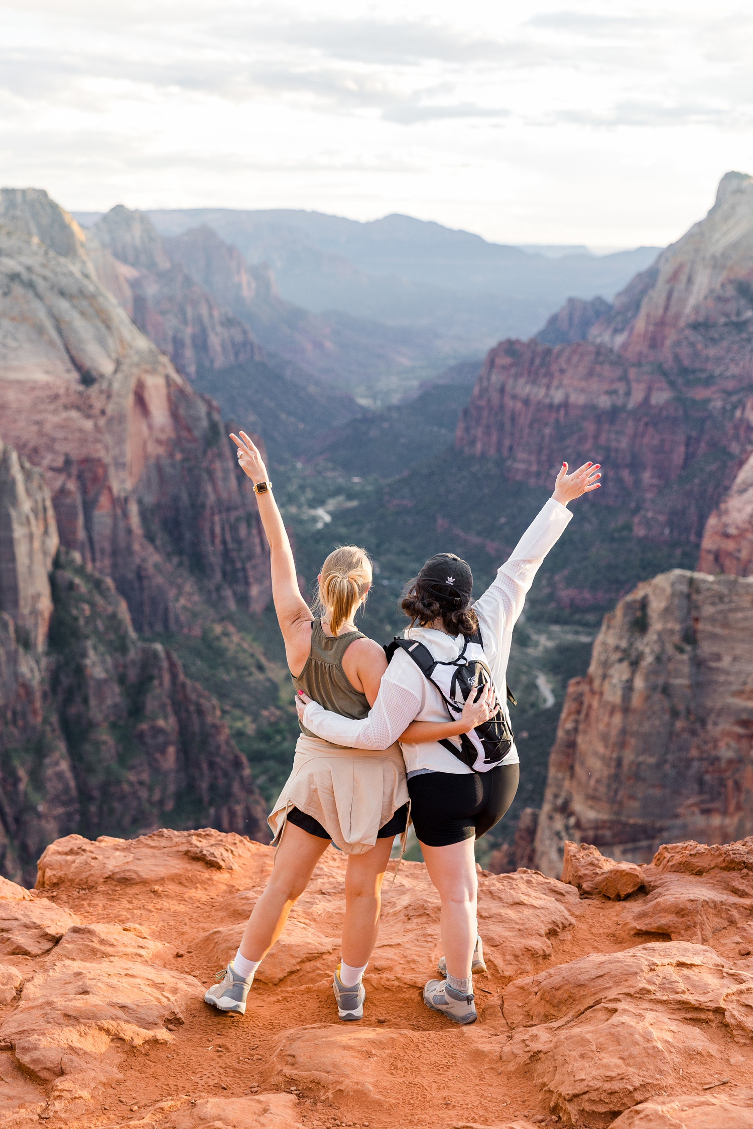 Jordan and I celebrating catching the sunset at Observation Point Zion National Park | CB Studio