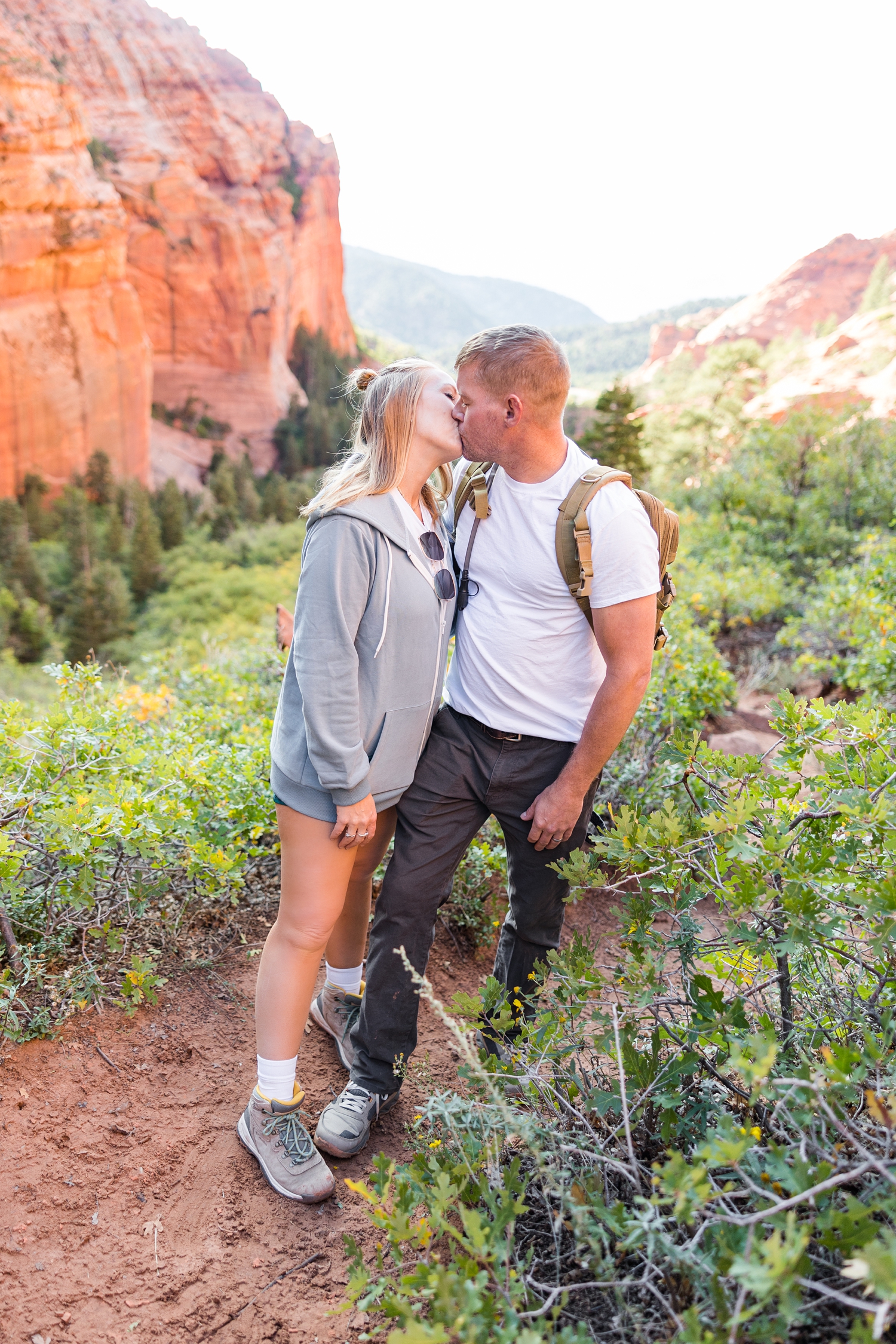Joe and I kissing in a scenic valley on South Taylor Creek Trail in the Kolob Canyon in Zion National Park | CB Studio