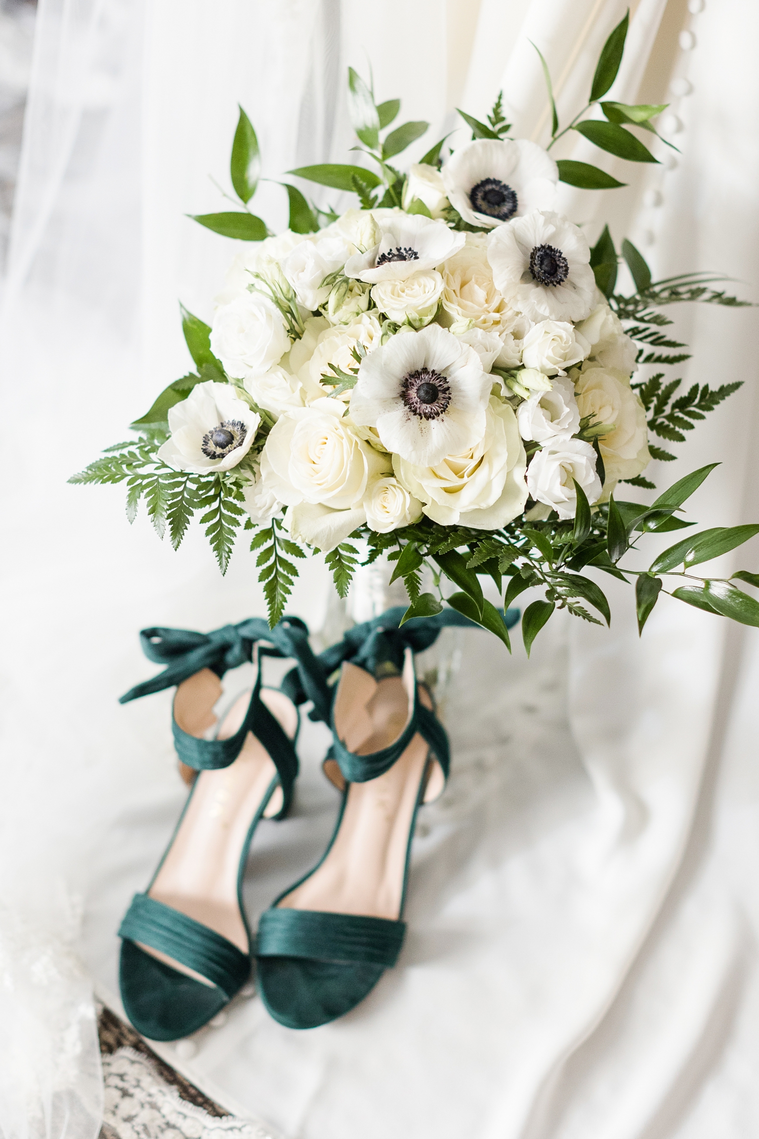White rose and anemone bridal bouquet with emerald green heels | CB Studio