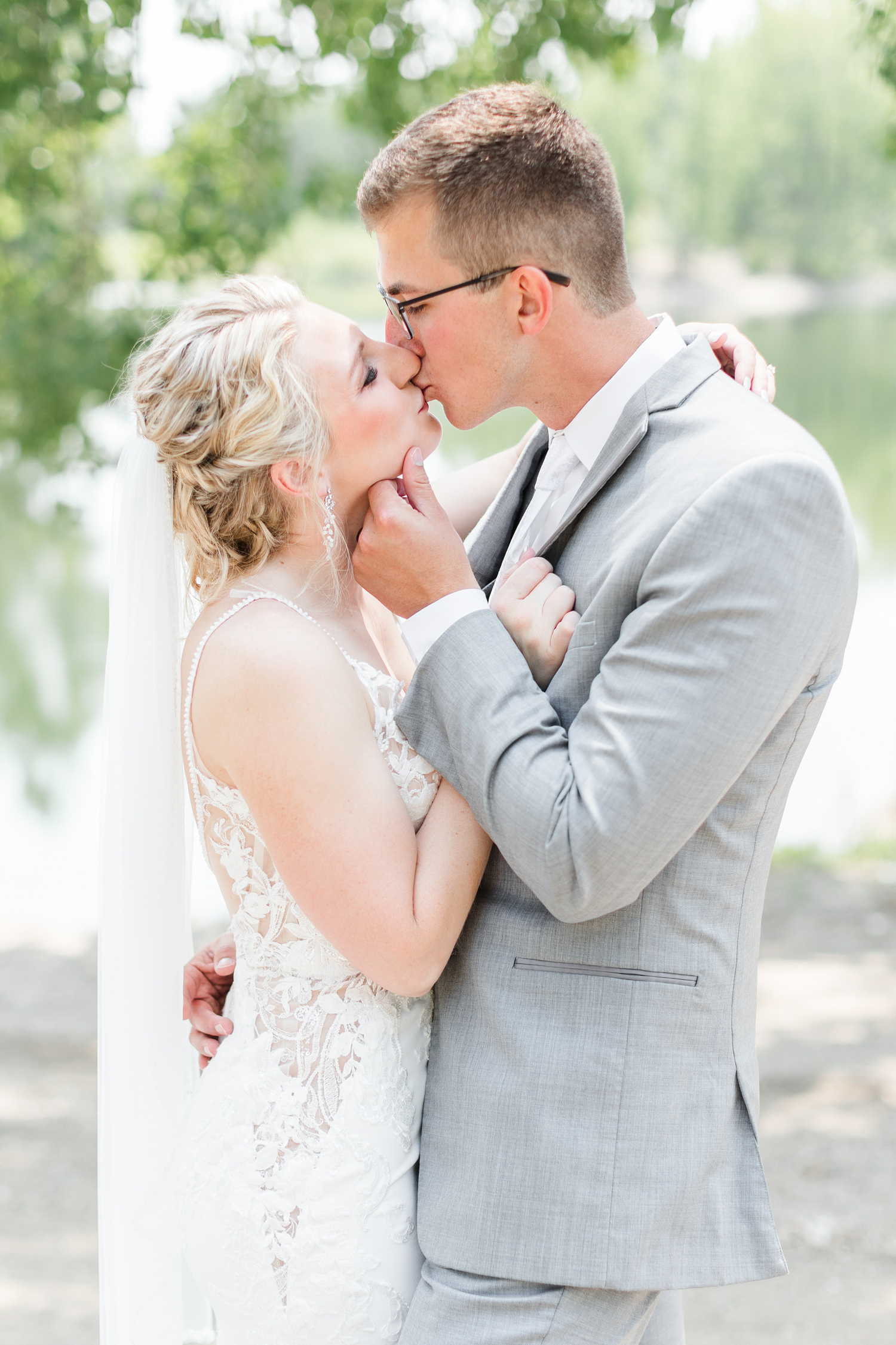 Quinton pulls Alli in for a kiss at Wild Haven in Algona, IA | CB Studio