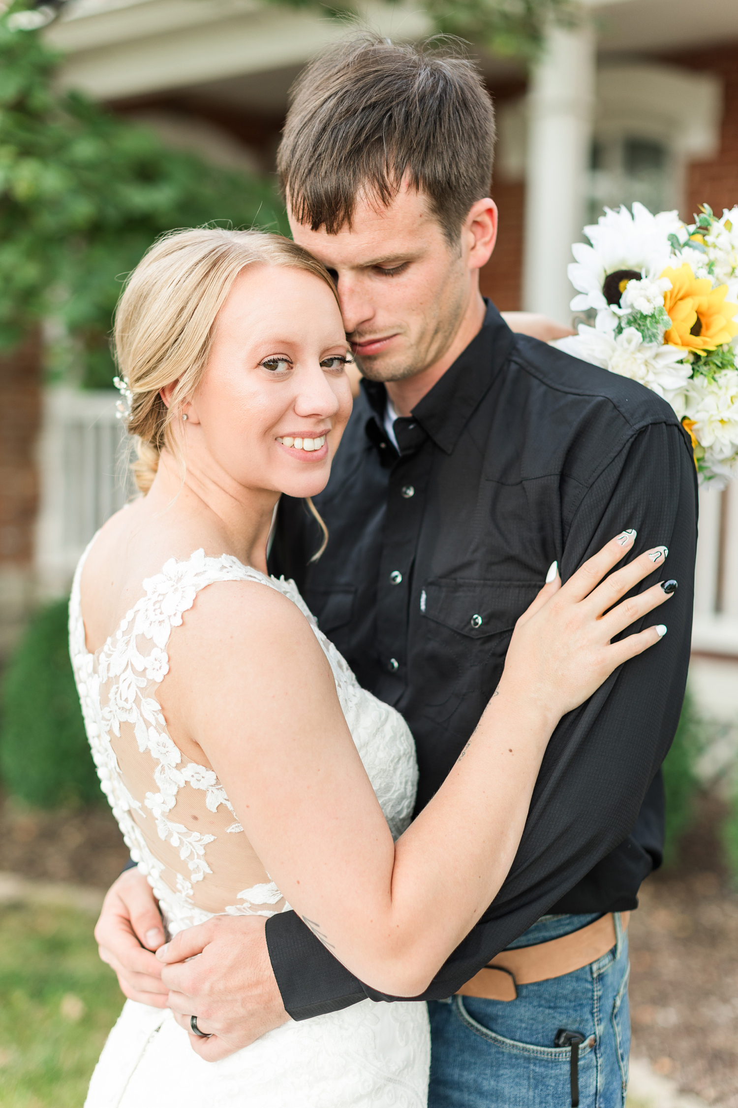 Zane nuzzles Mckennan close in front of the Mill Farm House at the Humboldt County Historical Museum | CB Studio