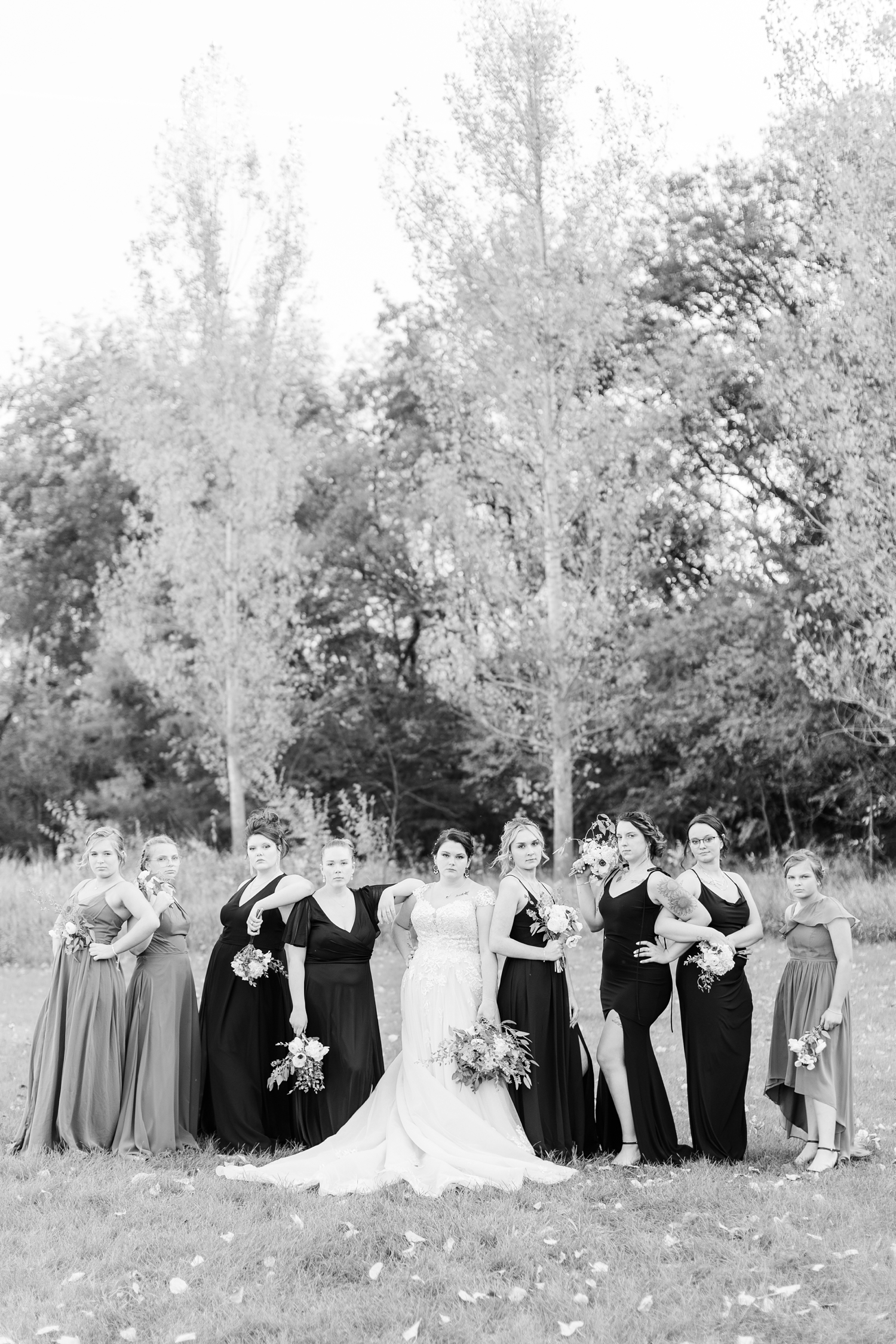 Mary and her bridesmaids pose at Sheldon Park, Humboldt, IA | CB Studio