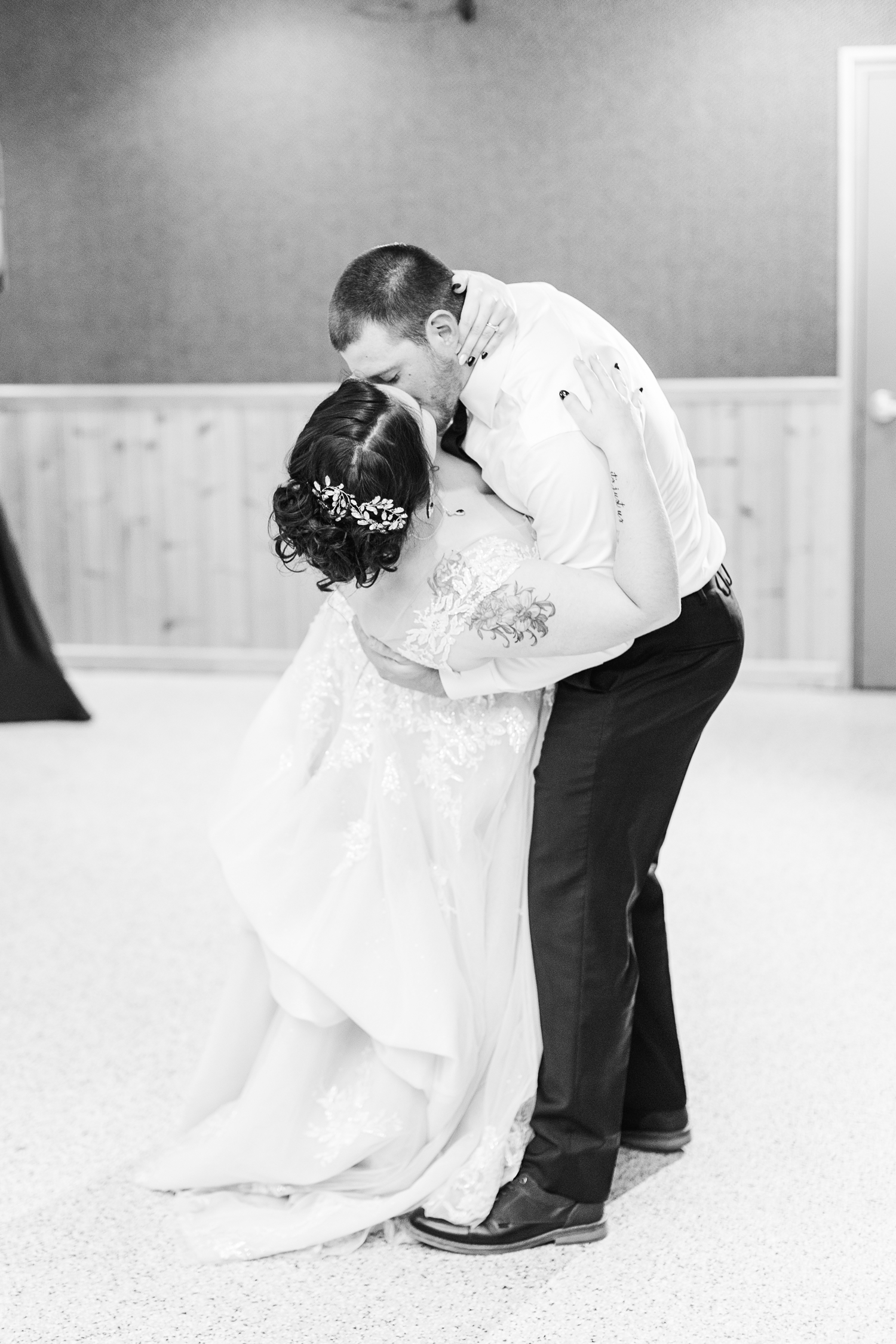 Austin dips his new bride, Mary, for a kiss at the end of their First Dance together at Humboldt County Fairgrounds | CB Studio