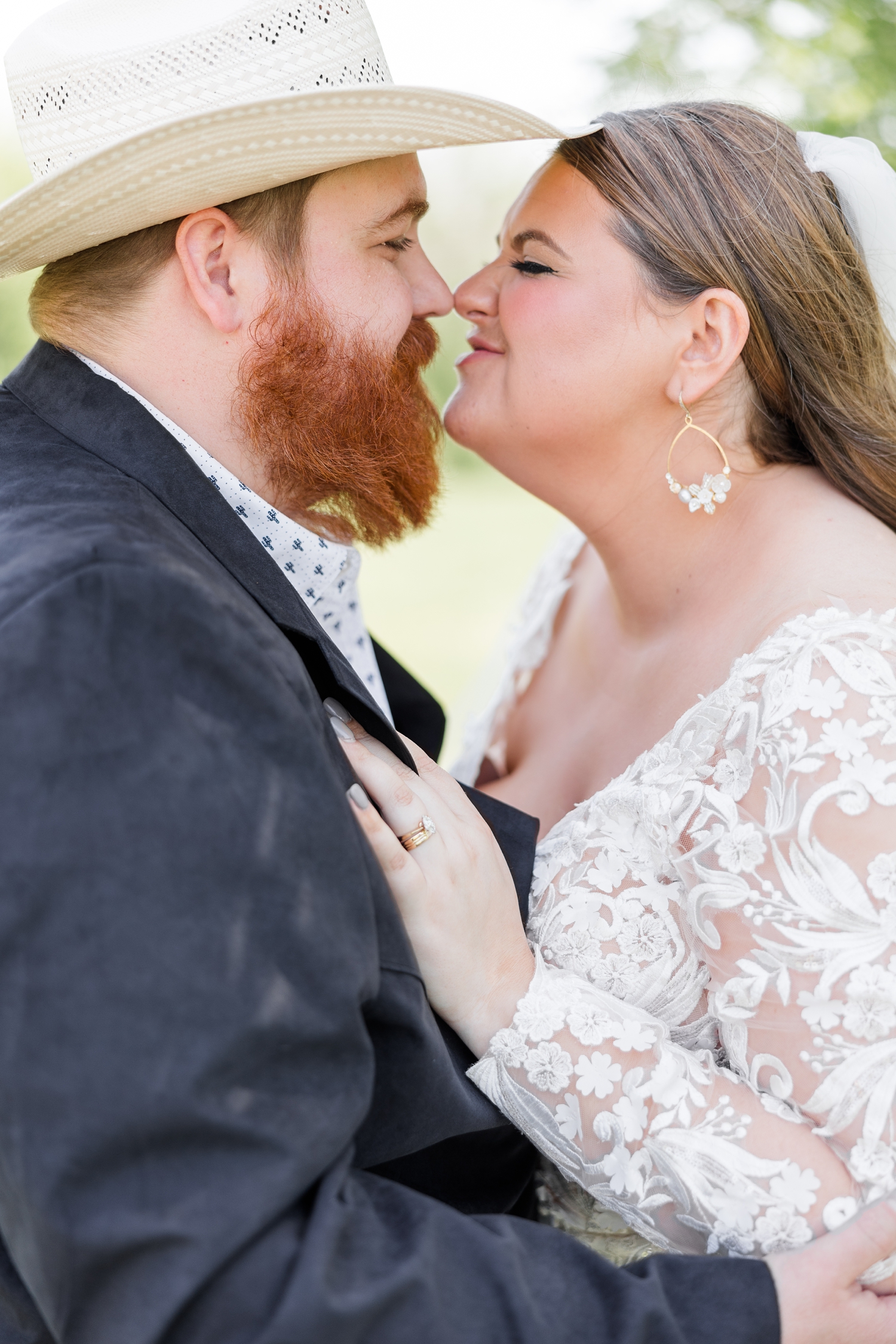 Trent and Neely eskimo kiss at Lizard Creek Ranch in Fort Dodge, IA | CB Studio
