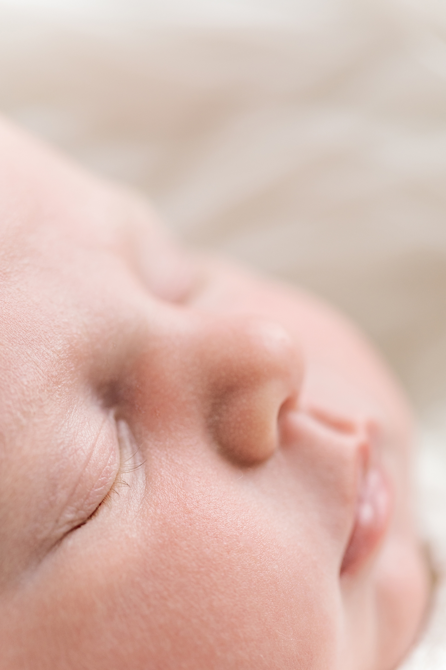 Close up detail image of baby Lylah's cheek and eyelashes | CB Studio