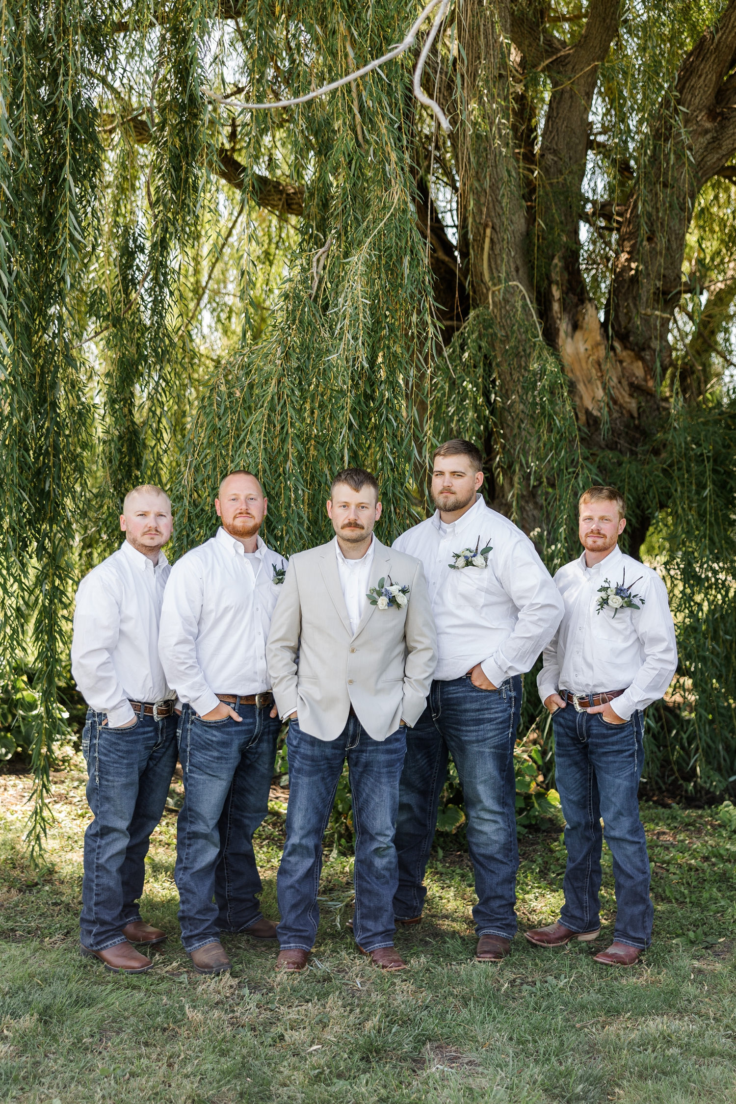 Ryan and his groomsmen stand stoically with a gorgeous weeping willow as the backdrop | CB Studio